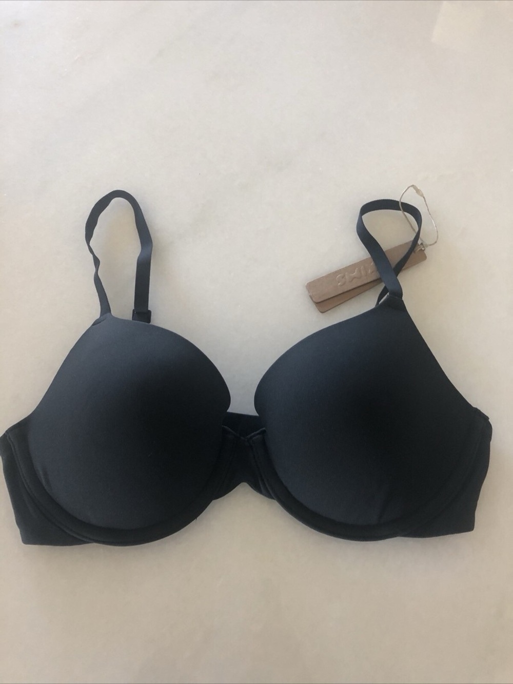 NWT SKIMS Fits Everybody T-Shirt Demi Bra in the color onyx.